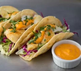 Fish Tacos with Cabbage Slaw and Spicy Sriracha Sauce